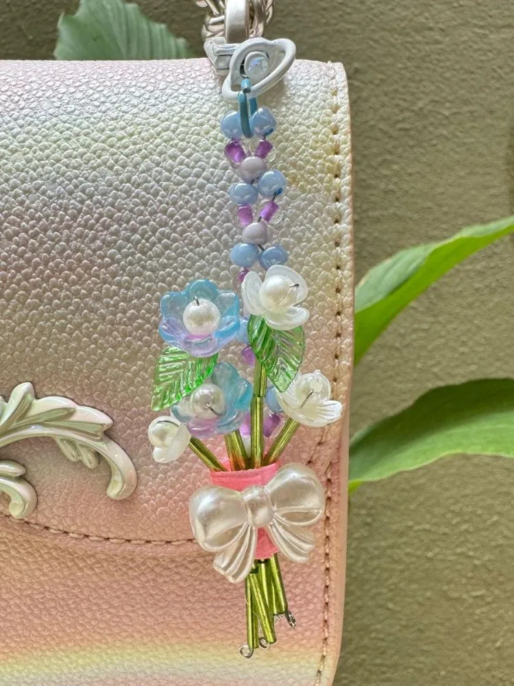 Bluebell Whisper Charm — handmade blue and lilac flower bag charm by MeShanvi Studio